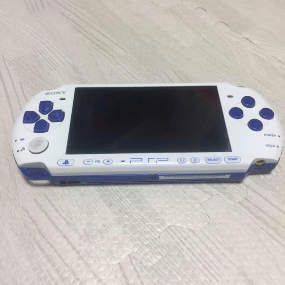 Sony White and Blue Handheld Gaming Console